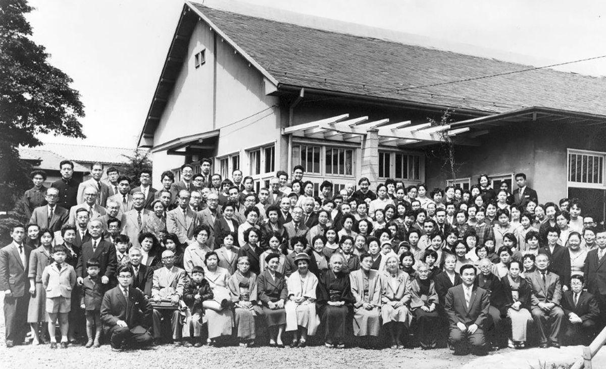 Tokyo Monthly Meeting farewell party, Rhoads seated front row, right of center, Copyright: Friends Girls Junior and Senior High School